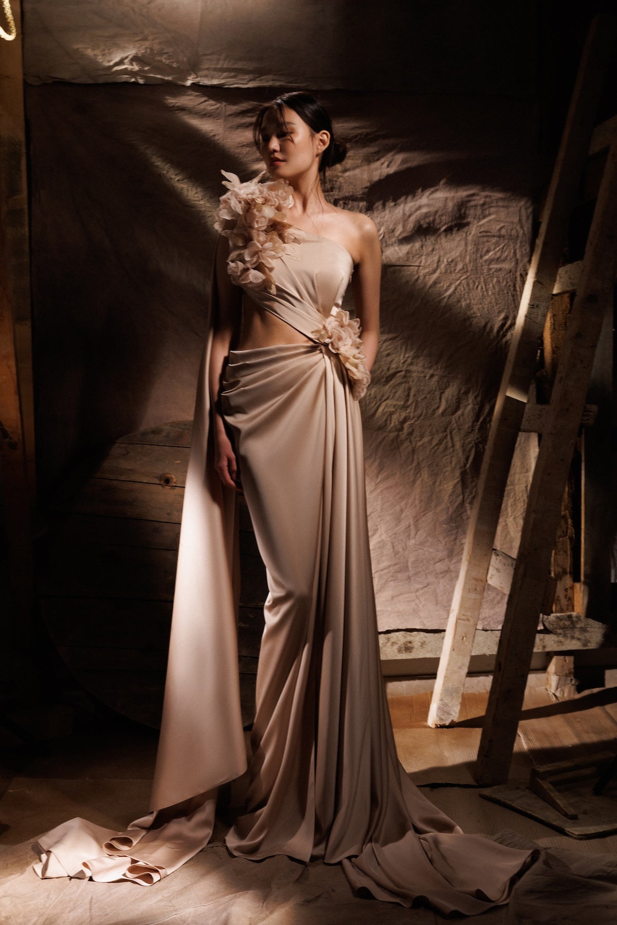 The draped beige satin dress
